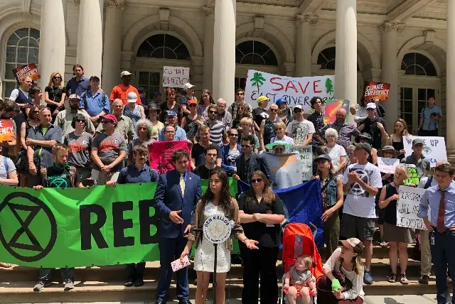 A City Hall rally on Tuesday demanding a resolution declaring a climate emergency.